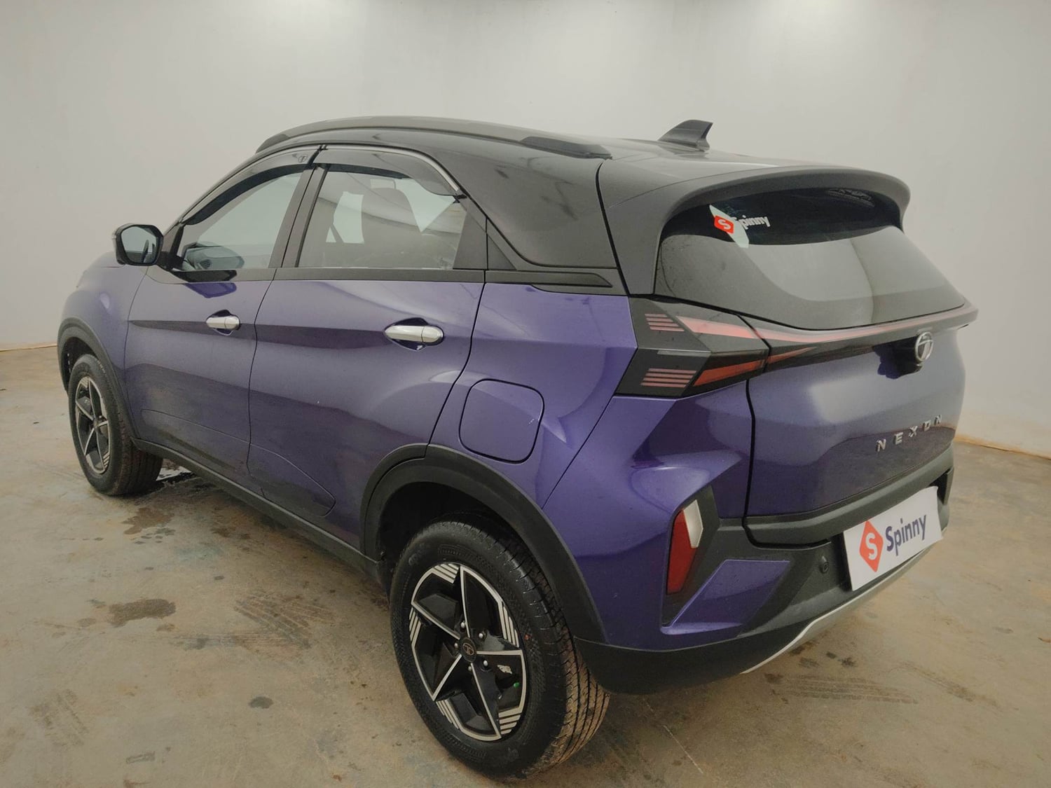 Used 2024 Tata Nexon Fearless Plus S Purple 1.5 Revotorq Diesel 6AMT Dual Tone Diesel Automatic exterior LEFT REAR CORNER VIEW