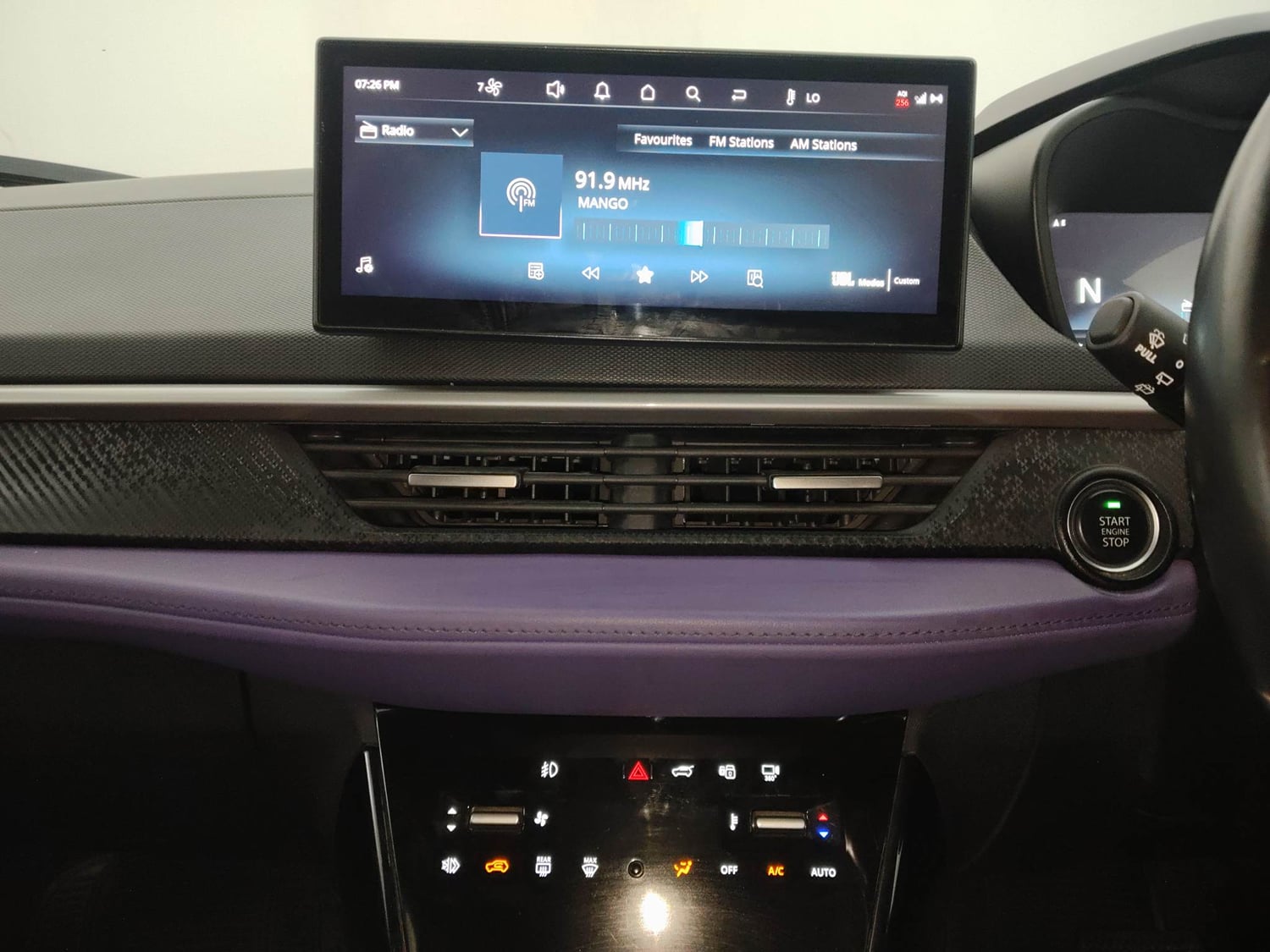 Used 2024 Tata Nexon Fearless Plus S Purple 1.5 Revotorq Diesel 6AMT Dual Tone Diesel Automatic interior MUSIC SYSTEM & AC CONTROL VIEW