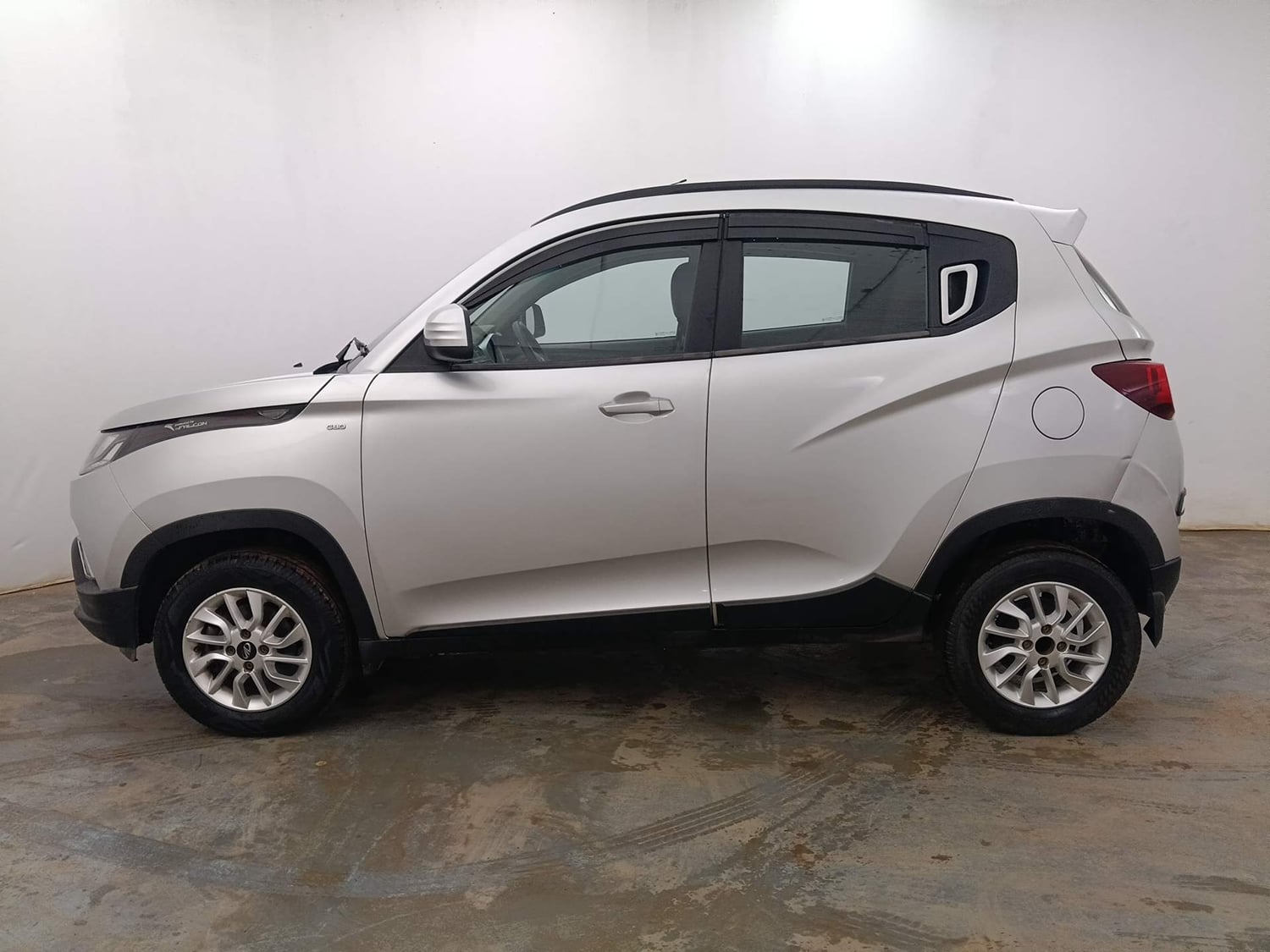 Used 2017 Mahindra KUV100 K8 6 STR Petrol Manual exterior LEFT SIDE VIEW