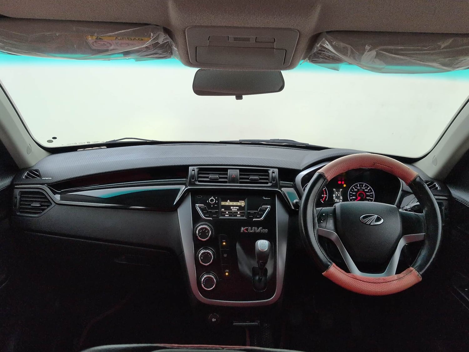 Used 2017 Mahindra KUV100 K8 6 STR Dual Tone Petrol Manual interior DASHBOARD VIEW