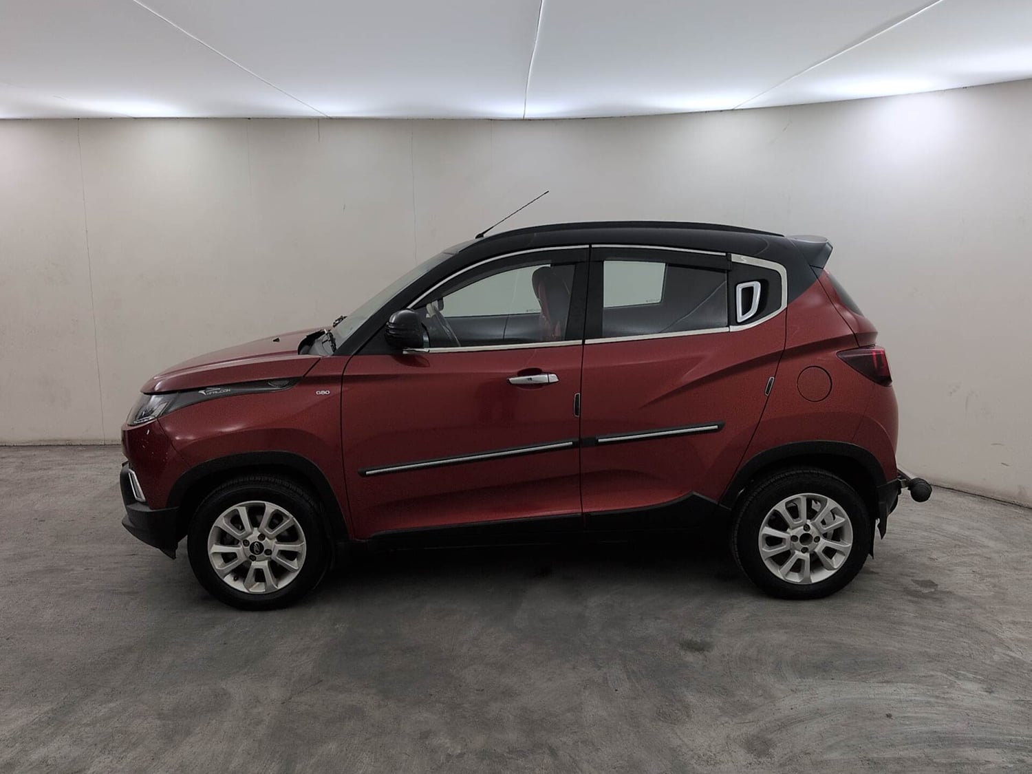Used 2017 Mahindra KUV100 K8 6 STR Dual Tone Petrol Manual exterior LEFT SIDE VIEW
