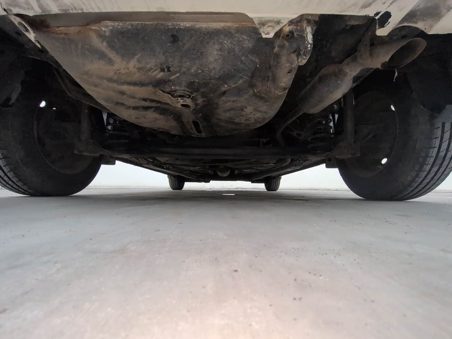 Used 2018 Maruti Suzuki Dzire VXi AMT Petrol Automatic extra REAR UNDERBODY VIEW (TAKEN FROM REAR)