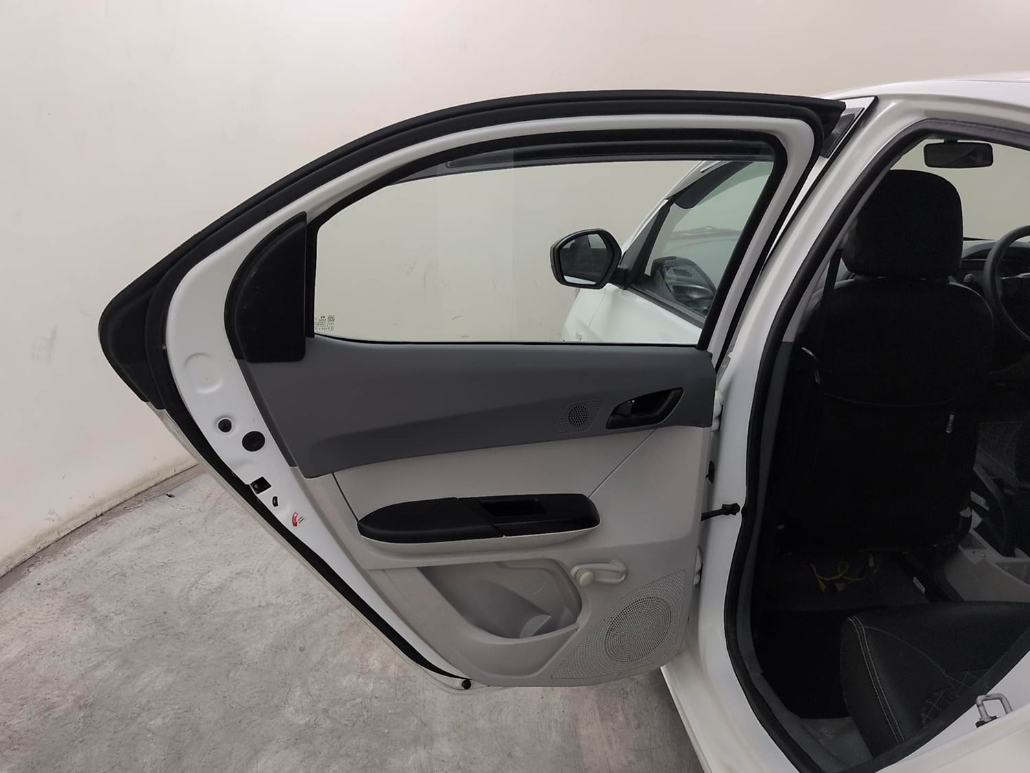 Used 2025 Tata Tiago XE Petrol Manual interior LEFT REAR DOOR OPEN VIEW