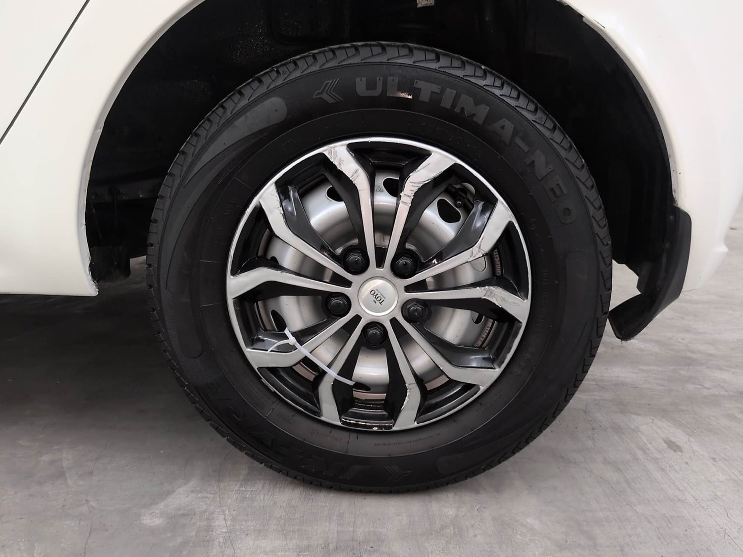 Used 2025 Tata Tiago XE Petrol Manual tyres LEFT REAR TYRE RIM VIEW