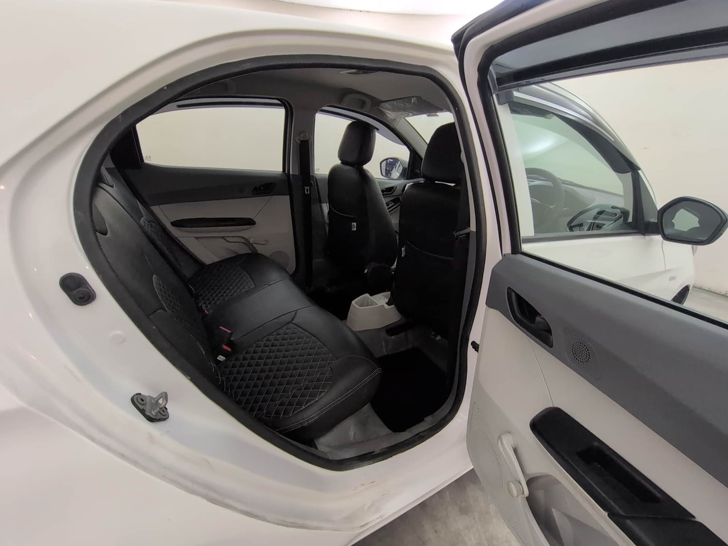 Used 2025 Tata Tiago XE Petrol Manual interior RIGHT SIDE REAR DOOR CABIN VIEW