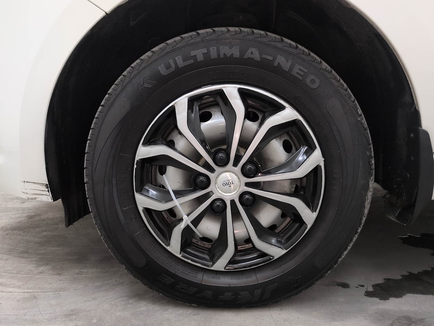 Used 2025 Tata Tiago XE Petrol Manual tyres LEFT FRONT TYRE RIM VIEW